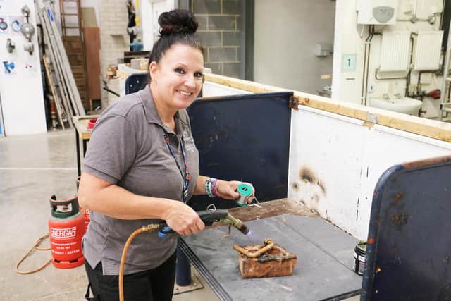 Tutor Heidi Rhodes swapped careers to venture into the construction trades