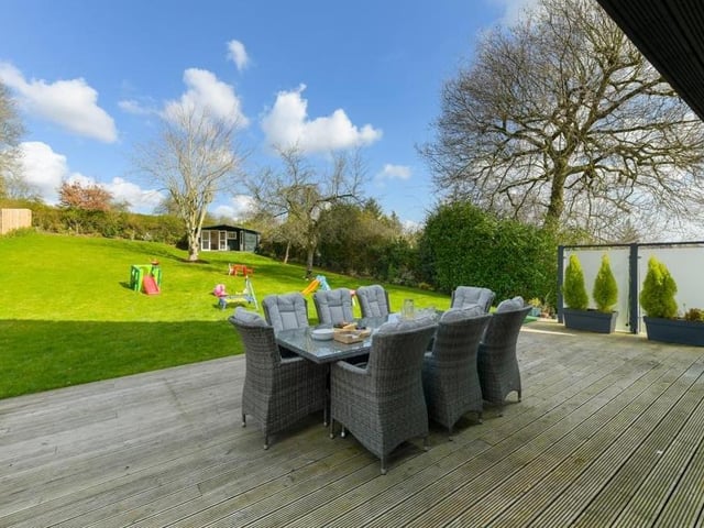 Moving outside now, and here is a decked seating area in the back garden.