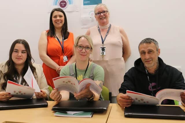 Peer support apprentices, front, from left, Chloe Martin, of West Nottinghamshire College, Cheryl McAulay-Wainwright, of Nottinghamshire Healthcare, and Clint Askew, of the Hepatitis C Trust, pictured with Saffron Bradshaw, peer support development worker at the trust, back left, and Sarah Halpin, CIPD teacher at the college.