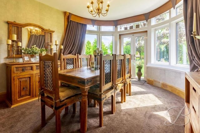 The dining room at the Churchmead residence is a delight, as you can see. Its appearance is topped off by a large bay window, facing the back of the house, and French doors giving access to the garden.