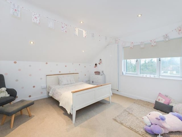 Let's move on to other bedrooms now, starting with this bright space.