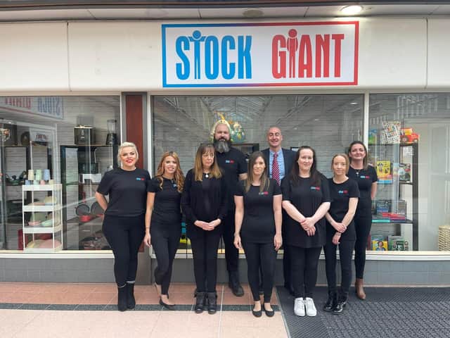 Stock Giant staff outside the new store in Idlewells Shopping Centre.