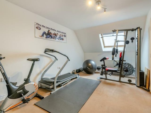 The sixth and final bedroom has been successfully converted into a fully equipped gym. It has a Velux roof window for extra light.