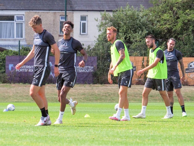 Reeco Hackett-Fairchild, having a laugh with some of his Pompey team-mates, will be hoping to be involved more this season with Pompey.  Picture: Habibur Rahman