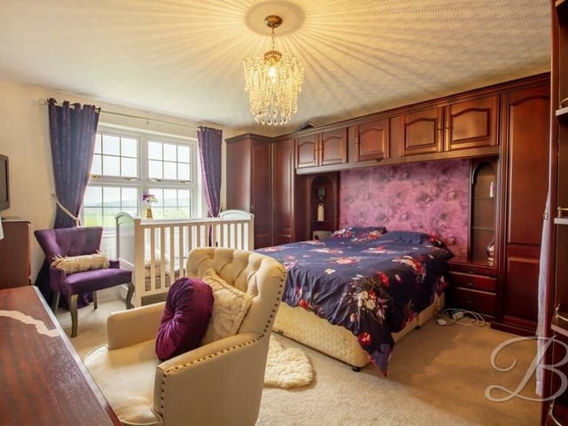 Time to inspect the four bedrooms now, starting with the master, which is the largest and overlooks the front of the New Mill Lane house. It has a carpeted floor.