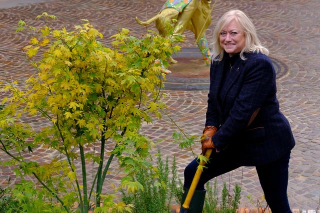 Barbara Smith, Managing Director, Brand Homes for Diageo in Scotland marks the official opening of Glenkinchie Distiller visitor experience and garden near Edinburgh by planting a ceremonial tree.