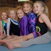Pictured are some of the junior gymnasts who trained with Mansfield's Olympic Gymnastic Club in 2011.