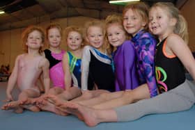 Pictured are some of the junior gymnasts who trained with Mansfield's Olympic Gymnastic Club in 2011.