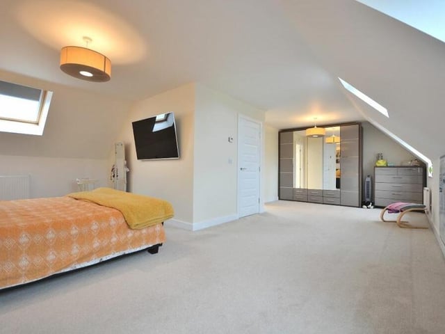 So vast is the master bedroom that there is room for a substantial range of wardrobes and also a dressing area. It has access to en suite facilities too.