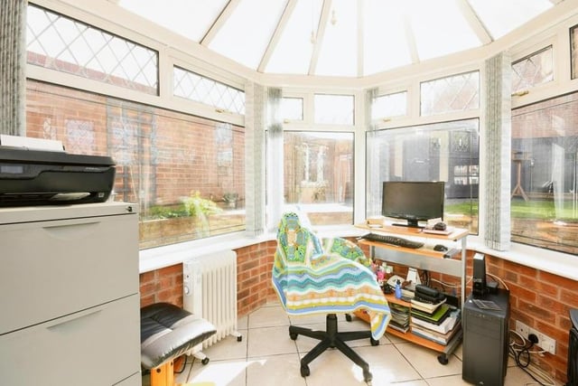 Here is that conservatory we were talking about. It's extremely bright and can even be converted into an office if required.