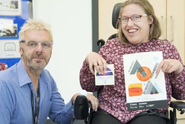 Andy Dawson, with a member of the Able Orchestra, has been shortlisted for a Hearts for the Arts Award. Photo: Mark Allsopp