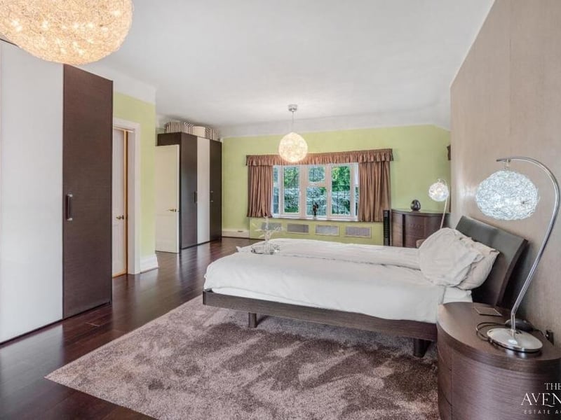 Another shot of the master bedroom, underlining its space and style.