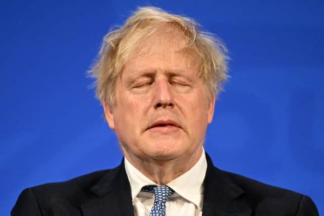 Prime Minister Boris Johnson giving a press conference following the publication of the report