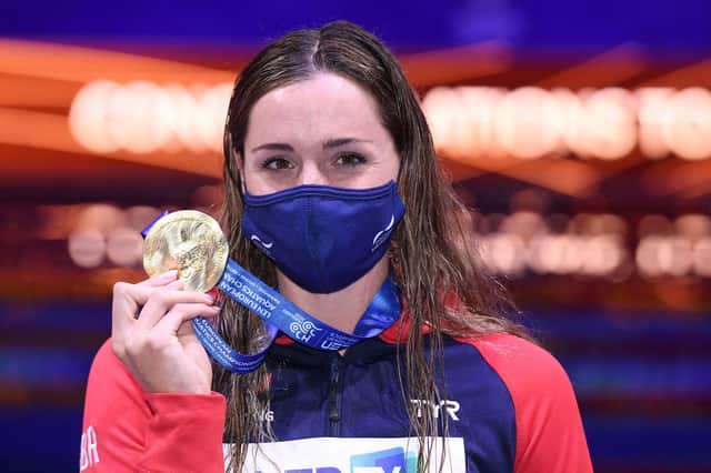 Wearing a mask on the podium can't hide Molly Renshaw's delight at European gold.