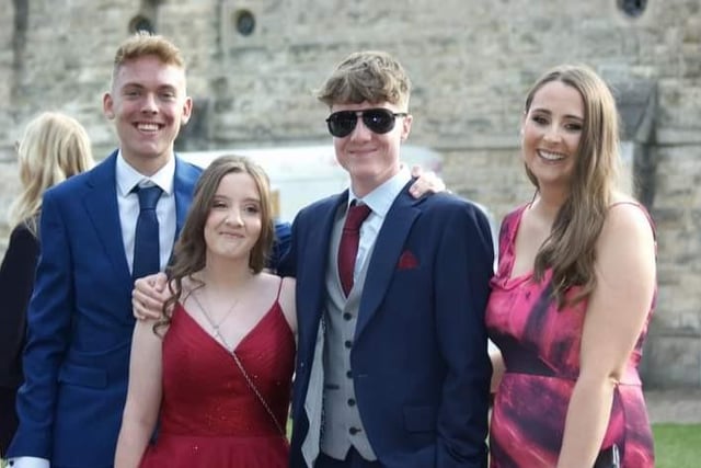 Twins Thomas and Bobbie Wilson with their head of year 11 and long-term school friend at the prom.