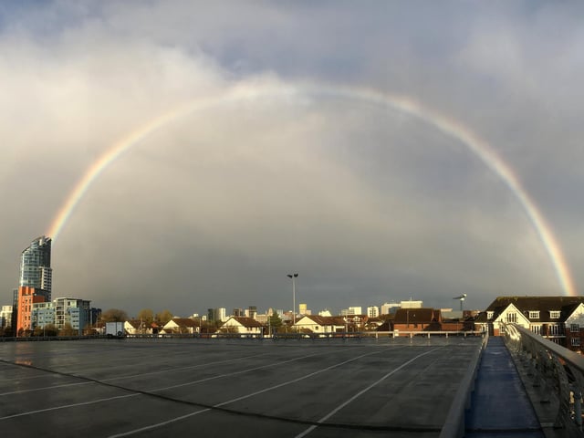 What a shot! It looks like the rainbow is coming from the Lipstick Tower at Gunwharf Quays.