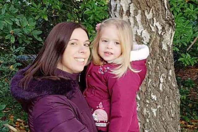 Claire with her three-year-old daughter Ellie.