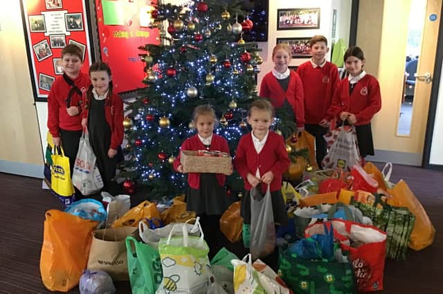 Pupils at Hollywell Primary School donated food and supplies to Eastwood Food Bank.