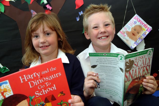 Rachel and Ryan Mellins, aged six and eight at the time, who took part in the Big Wild Read summer reading project at Edwinstowe Library where they were presented with certificates and medals after completing six books. Year: 2007