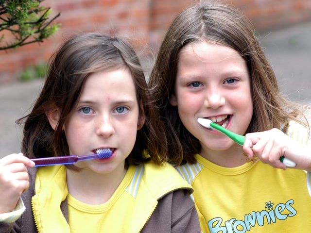 back in 2007 Louise Read and Clarisa Drury members of the 1st Warsop Guides and Brownies got ready for the off in the attempt on the record for the number of people cleaning their teeth at the same time held to raise money for Childline at the Warsop Parish Centre