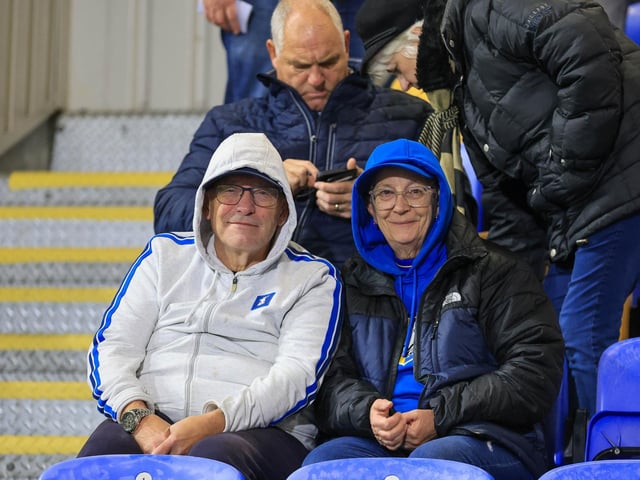 Travelling Mansfield Town fans during the Sky Bet League One match against AFC Wimbledon at Stadium Plough Lane.