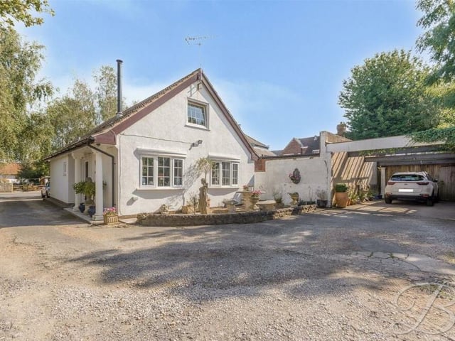 The last photo of our gallery returns to the front of the £400,000 Kirkby bungalow, which boasts undoubted kerb appeal.