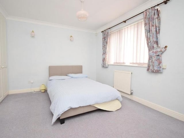 Time to move upstairs now, so let's start with the master bedroom, which is a lovely, big double. It has useful, built-in wardrobes and a dresser, plus its own en suite shower room.