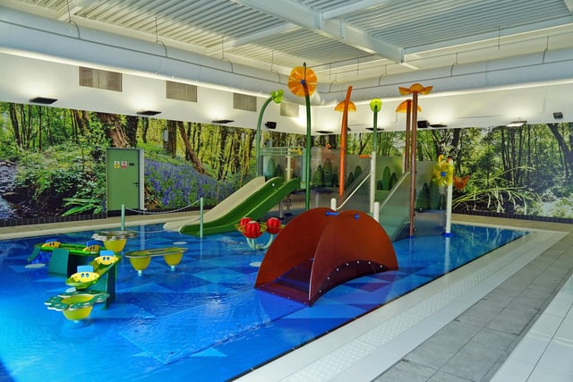 A children's play area in the pool area.