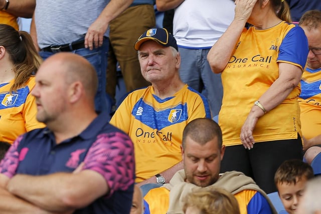Mansfield Town fans watch the Stags beat Tranmere Rovers last season.