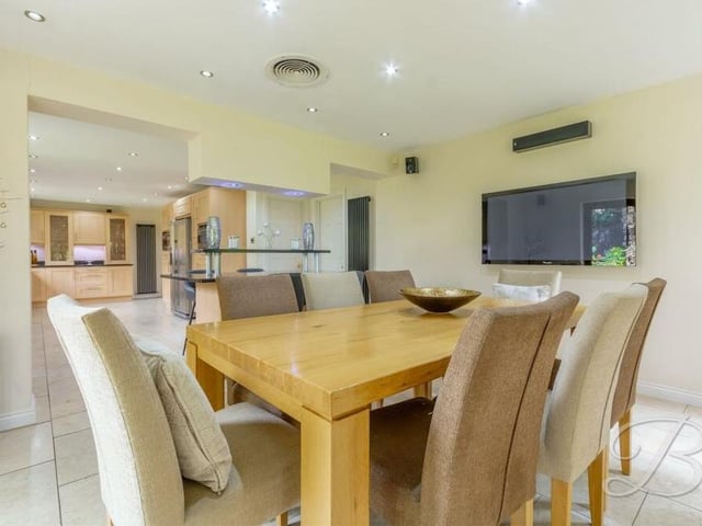 The kitchen at the £725,000 Berry Hill property flows seamlessly into this delightful dining area.