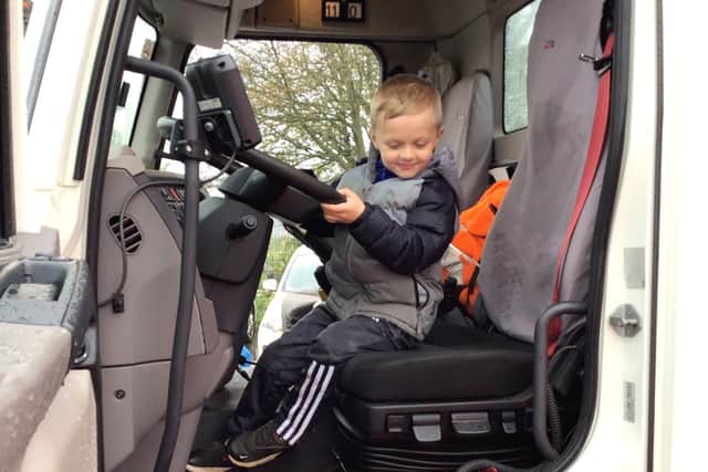 Younger pupils enjoyed the chance to sit in the driver's seat of a waste disposal lorry.