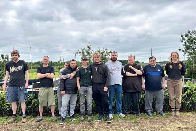 Ben Sofield with recovery volunteers at Rhubarb Farm.