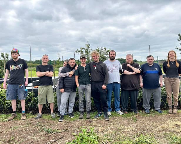 Ben Sofield with recovery volunteers at Rhubarb Farm.