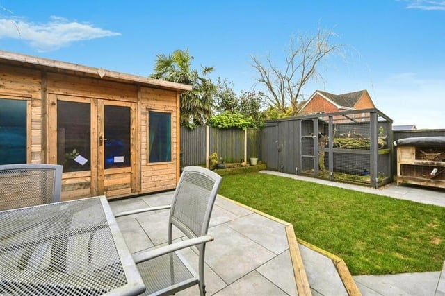 A raised seating area in the enclosed back garden is ideal in the summer for relaxing with a cuppa or a glass of wine.