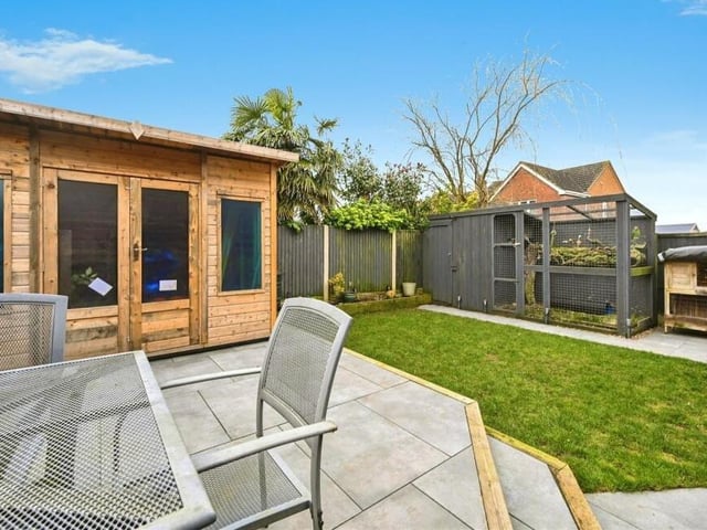 A raised seating area in the enclosed back garden is ideal in the summer for relaxing with a cuppa or a glass of wine.