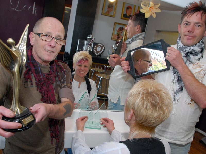Sutton's The Look Hair and Beauty Academy were celebrating in 2010 after owner Chris Godfrey, left won four trophies at The National Hairdressers Federation Cheshire Championships on Sunday. Chris walked away with best Modern Colour Cut and Blow, Modern Long Hair Down, Modern Long Hair up making him the overall champion. Chris is pictured at his salon on Monday with Business Partner Julia Fern, centre and Senior Stylist and partner Ian Peacock.