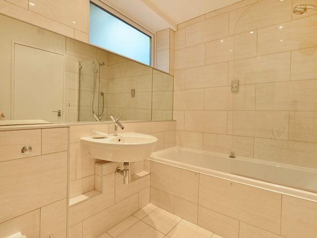 There is a modern family bathroom on the first floor.