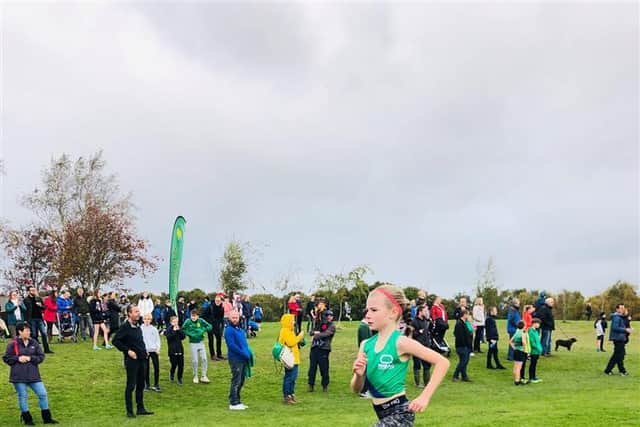 Lily Mason, aged 10, who is doing a 10k run for the NHS