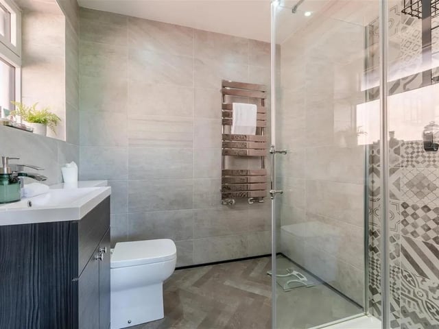 One of two stunning en suite bathrooms in the property.