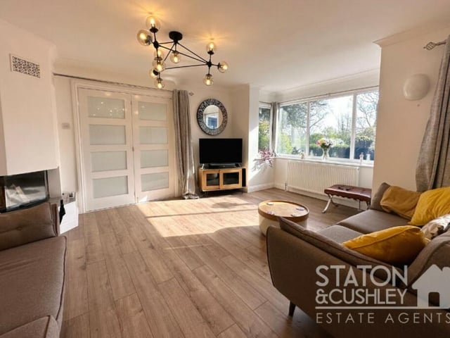A second view of the open-plan lounge, which is spacious and bright.