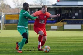 Two goal Man of the Match Craig Westcarr (Green) in action for Sherwood Colliery. Image: Mark Woolterton.
