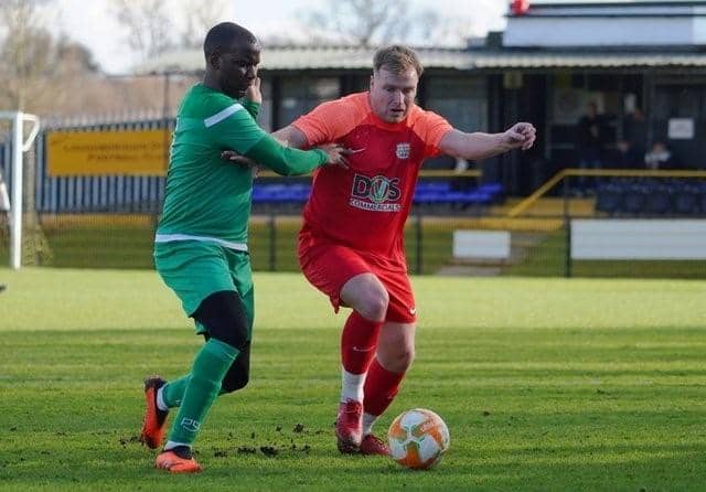 Two goal Man of the Match Craig Westcarr (Green) in action for Sherwood Colliery. Image: Mark Woolterton.