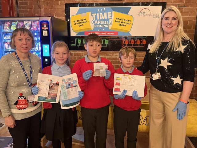 Pam Thompson, Abbie, Leo, Logan and Helen Strauther from St Peter's Primary with tems for the new capsule.