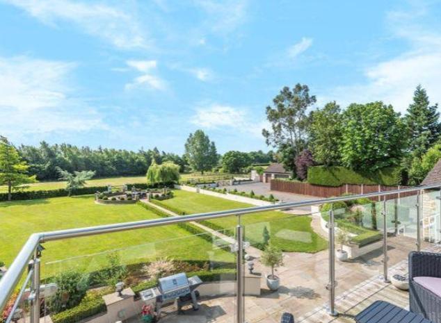 The famous bedroom balcony offers splendid views over the rear of the property.