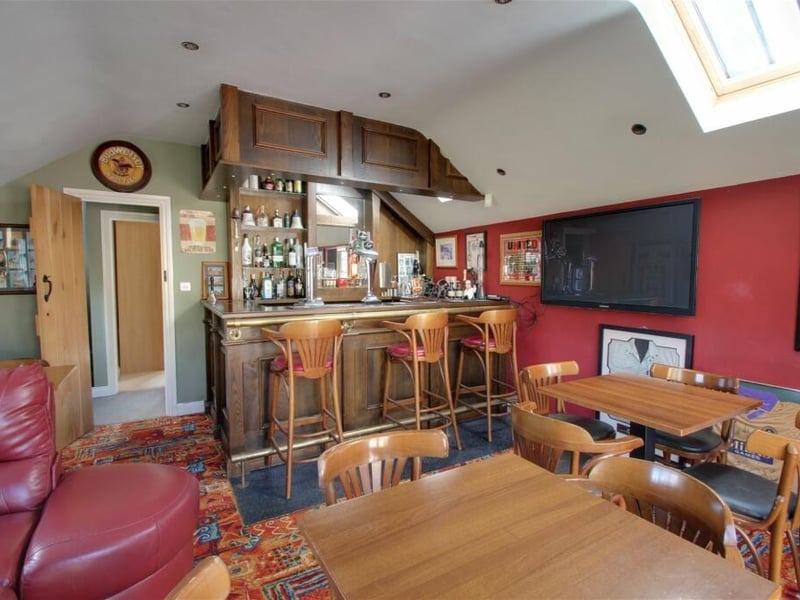 This is probably what you've been waiting for on our tour of the Whitwell farmhouse -- the amazing sun room and bar. It is a versatile space that has a fully functioning bar, equipped with pumps and a sink unit. There is plenty of space for traditional pub furniture.