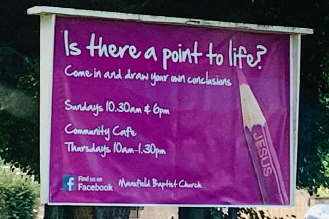 The sign outside of the Mansfield Baptist Church which asks 'Is there a point to life?'