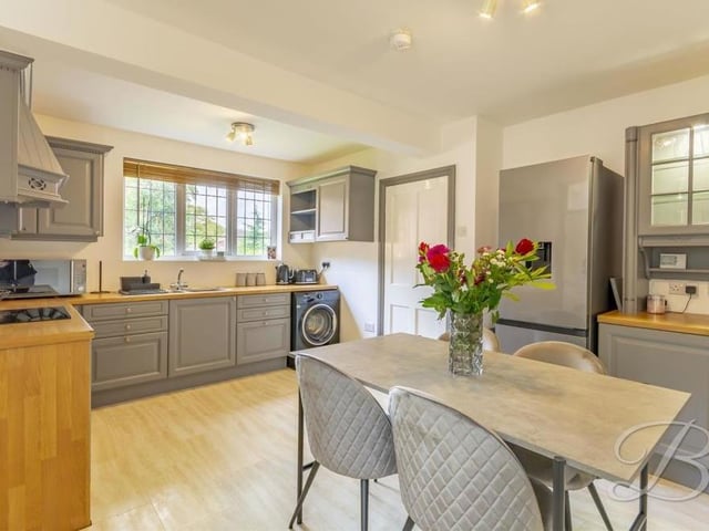 The annexe kitchen has plenty of space for a dining table or breakfast table, not to mention a fridge freezer.