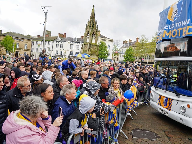 Crowds packed into Mansfield town centre this afternoon to salute their heroes.