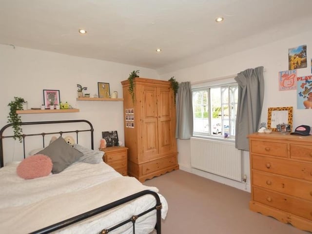 There is ample space for wardrobe, drawers and cupboards in this bedroom