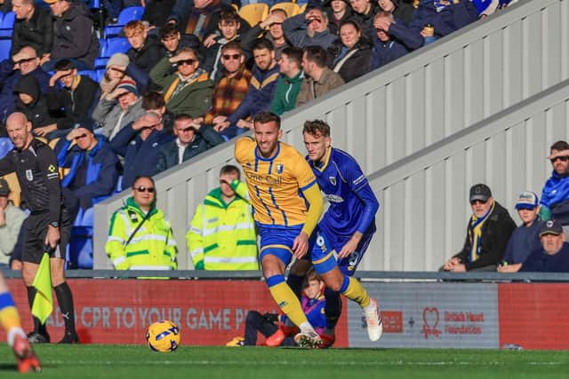 Action during the Sky Bet League 2 match against AFC Wimbledon at Cherry Red Records Stadium, 13 December 2025 Photo Chris Holloway / The Bigger Picture.media